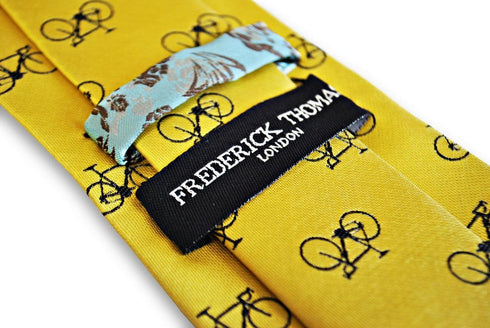 yellow tie with navy bicycle design